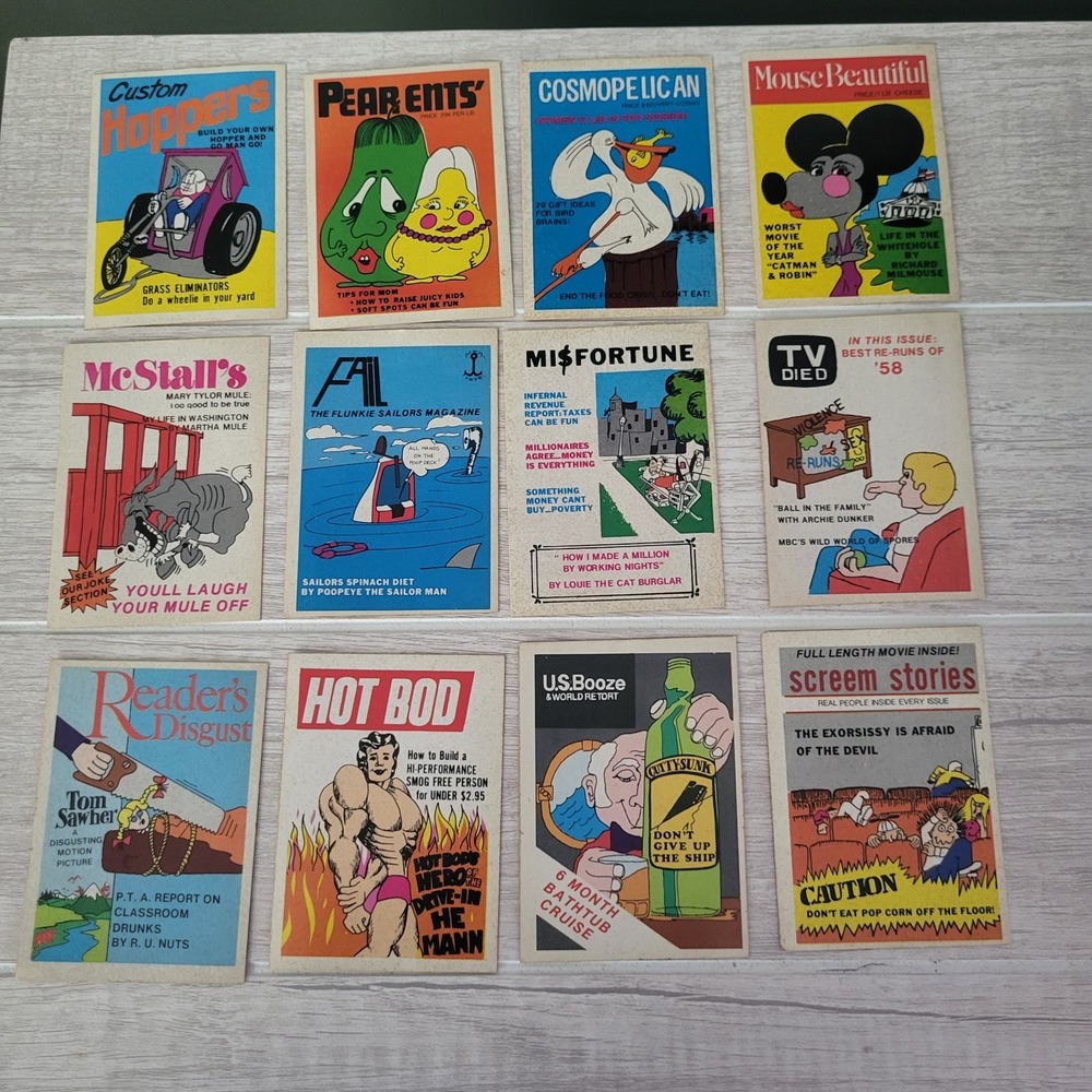 Lot Of 12 vintage collectibles are 1973–1974 Fleer Crazy Covers sticker cards